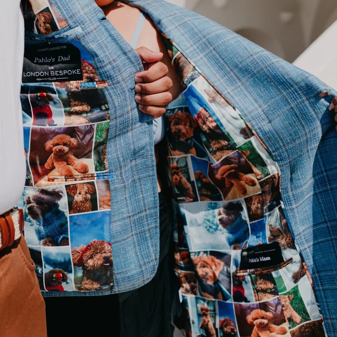 Both jackets opened to show matching photo linings of their dog Pablo and personalised labels