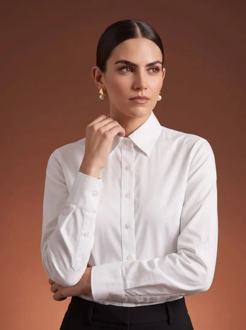White tailored shirt with pointed collar and long cuffs