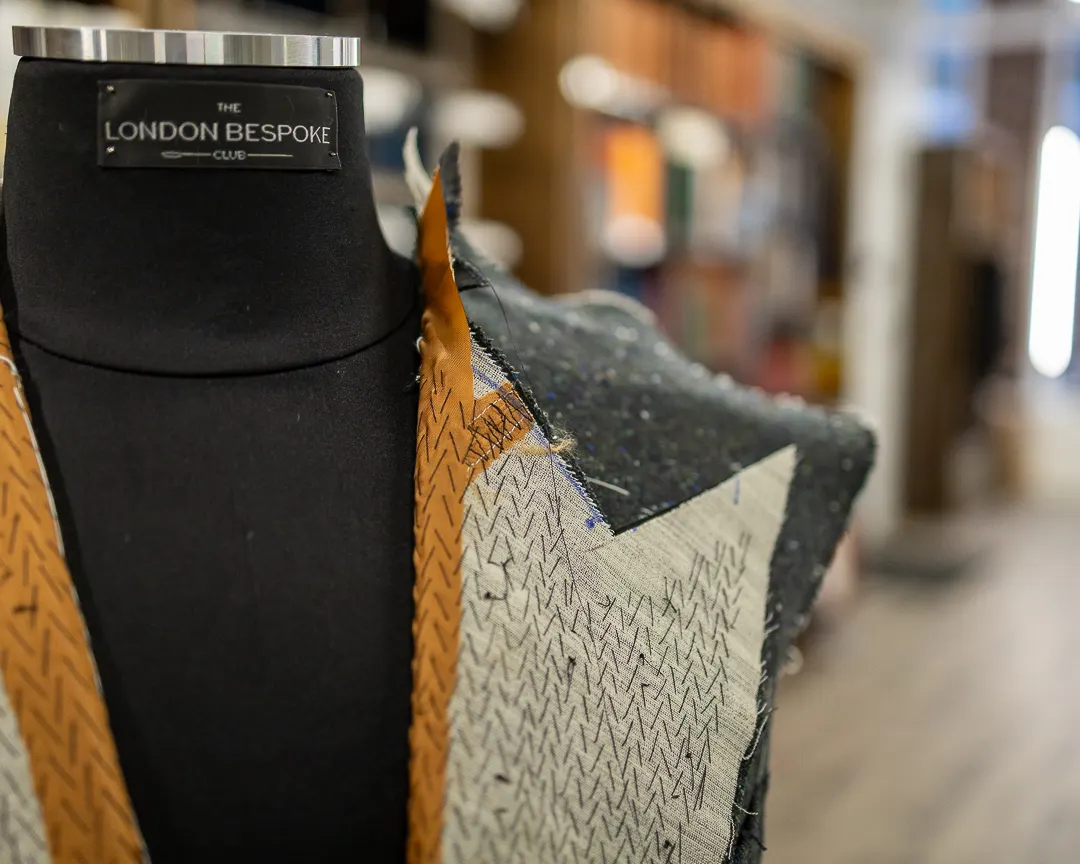 Hand-padded canvas construction inside a bespoke jacket